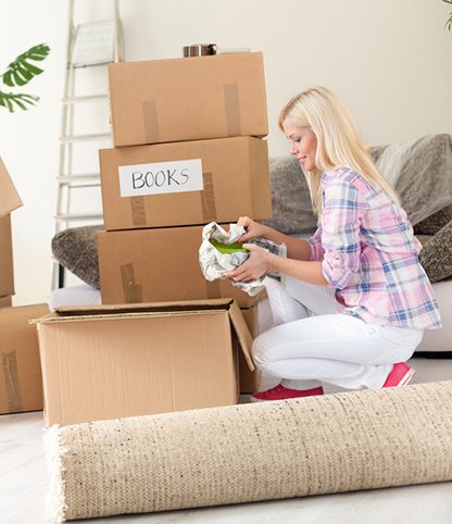 Organising boxes before moving out - Steiney Removalists in Towoomba, QLD